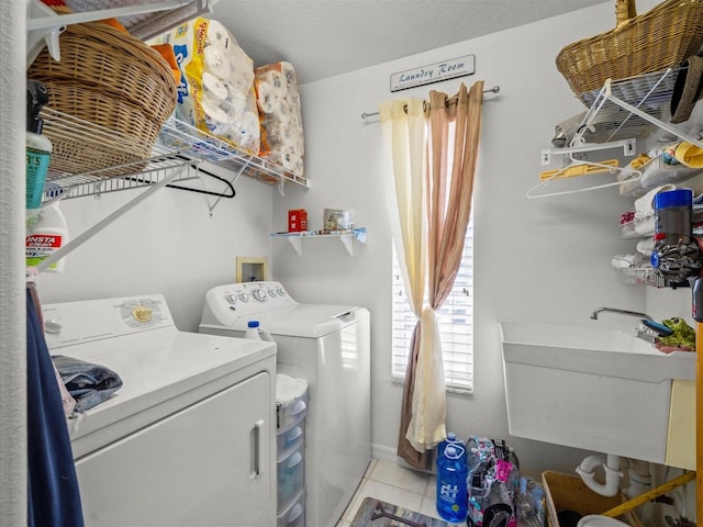 4292 Tahiti Dr, Hernando Beach, FL 34607 - washroom with washer and dryer, tile patterned flooring, and baseboards