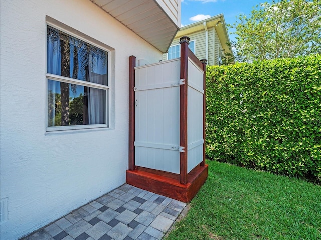 4292 Tahiti Dr, Hernando Beach, FL 34607 - view of side of home with stucco siding