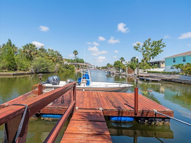 4292 Tahiti Dr, Hernando Beach, FL 34607 - dock featuring a water view and boat lift