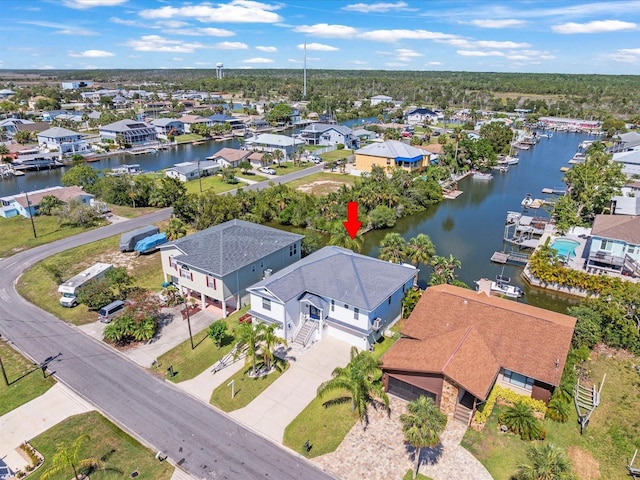 4292 Tahiti Dr, Hernando Beach, FL 34607 - aerial perspective of suburban area with a large body of water