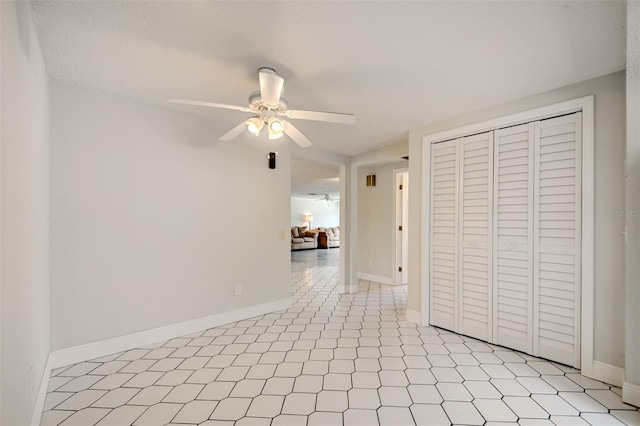 6231 Westport Dr, Port Richey, FL 34668 - empty room featuring a ceiling fan and baseboards