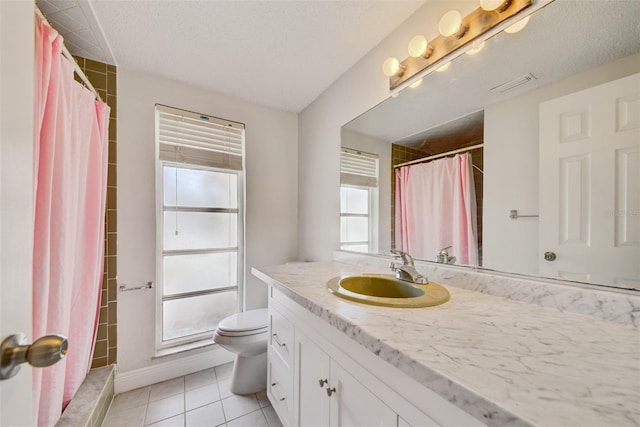6231 Westport Dr, Port Richey, FL 34668 - full bath featuring toilet, vanity, tile patterned flooring, a textured ceiling, and curtained shower