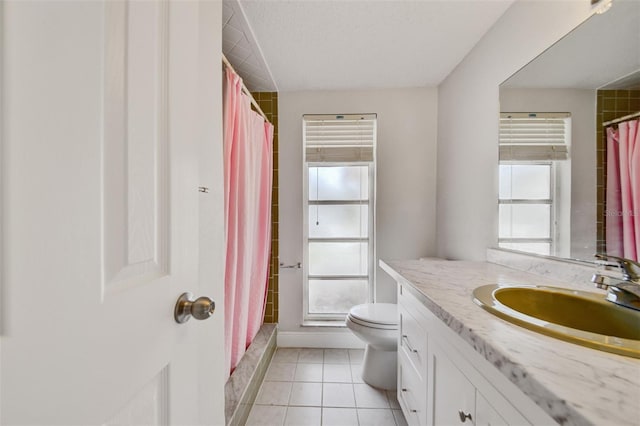6231 Westport Dr, Port Richey, FL 34668 - bathroom with vanity, toilet, tile patterned floors, and a shower with shower curtain