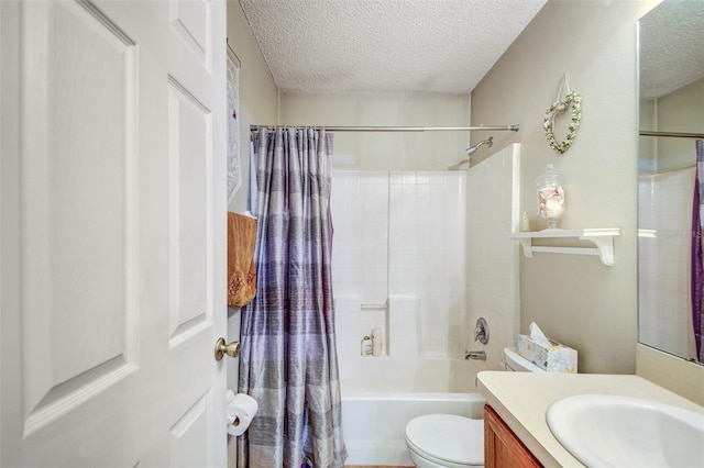 bathroom featuring vanity, a textured ceiling, toilet, and shower / bath combo with shower curtain