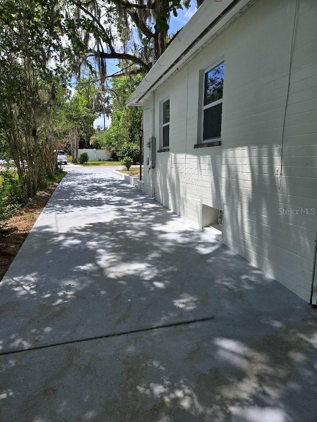 2827 SE 2nd St, Ocala, FL 34471 - view of home's exterior with a patio area