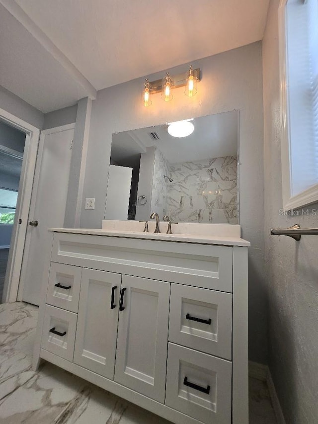 2827 SE 2nd St, Ocala, FL 34471 - bathroom with marble finish flooring and vanity