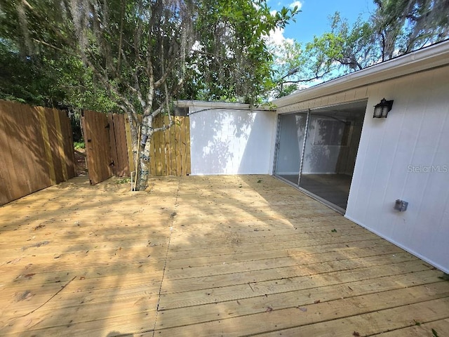 2827 SE 2nd St, Ocala, FL 34471 - wooden terrace with fence