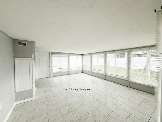 13228 3rd St E, Madeira Beach, FL 33708 - view of unfurnished sunroom