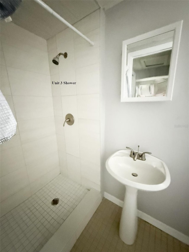 13228 3rd St E, Madeira Beach, FL 33708 - full bathroom with a stall shower and tile patterned floors