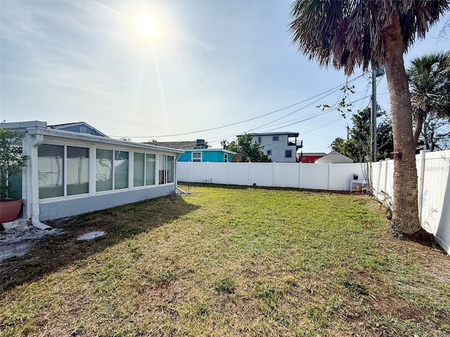 13228 3rd St E, Madeira Beach, FL 33708 - view of yard with a sunroom