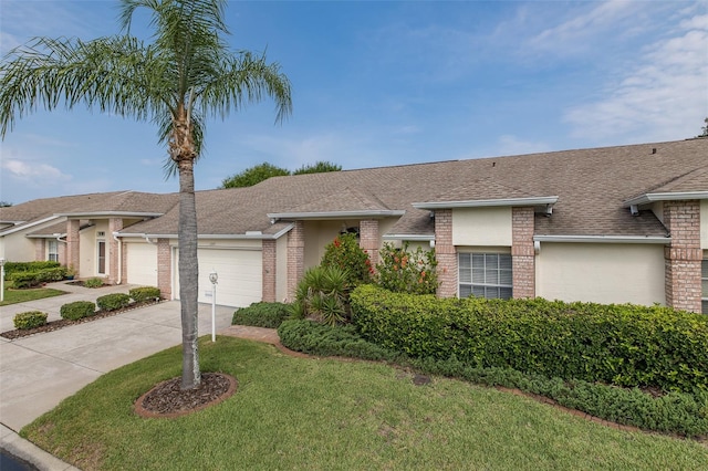 1105 Flora Vista St, New Port Richey, FL 34655 - view of front of house with brick siding, an attached garage, driveway, a front yard, and roof with shingles