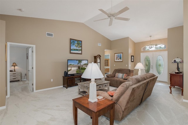 1105 Flora Vista St, New Port Richey, FL 34655 - living area with light colored carpet, high vaulted ceiling, and baseboards