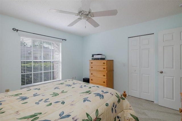 1105 Flora Vista St, New Port Richey, FL 34655 - bedroom featuring a closet, light colored carpet, and a ceiling fan