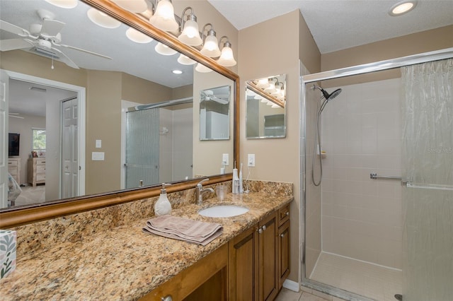 1105 Flora Vista St, New Port Richey, FL 34655 - full bath with tiled shower, ceiling fan, and vanity