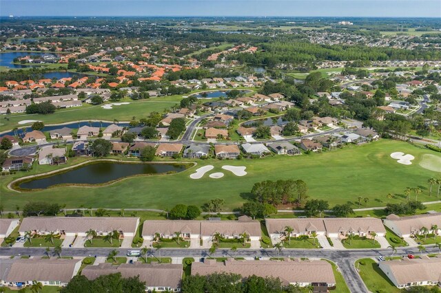 1105 Flora Vista St, New Port Richey, FL 34655 - aerial overview of property's location featuring nearby suburban area, a large body of water, and a golf club