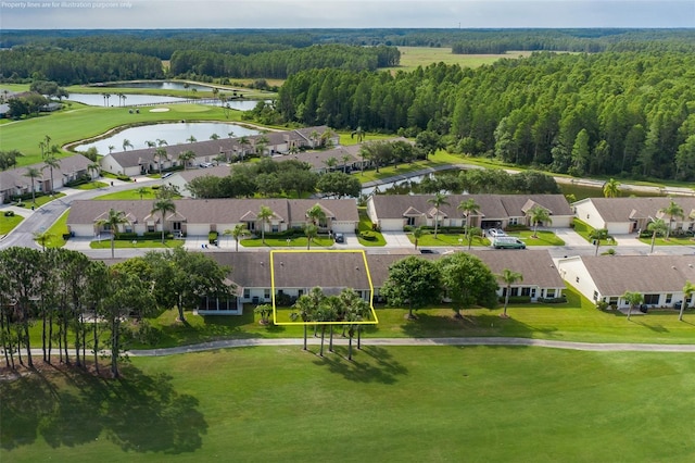 1105 Flora Vista St, New Port Richey, FL 34655 - aerial perspective of suburban area featuring property boundaries highlighted, a large body of water, and a heavily wooded area