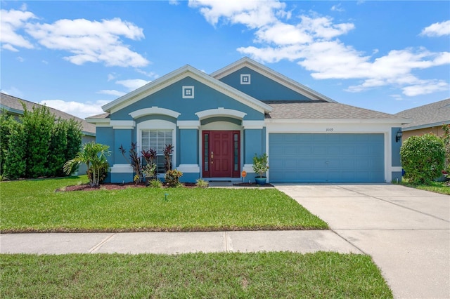 1009 Summer Breeze Dr, Brandon, FL 33511 - view of front of house featuring stucco siding, a garage, a front yard, and concrete driveway