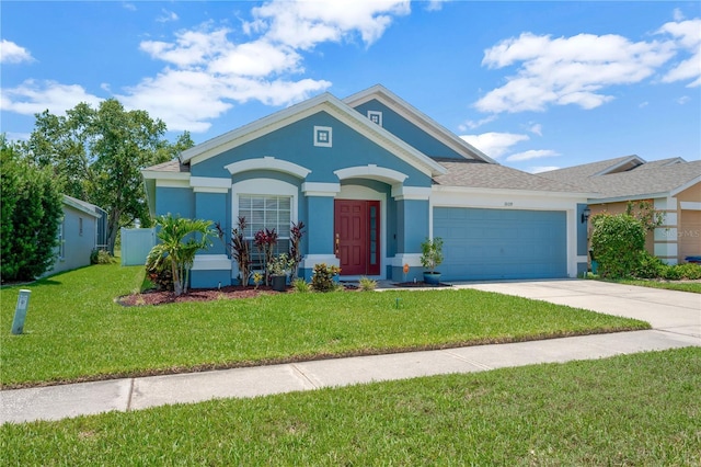 1009 Summer Breeze Dr, Brandon, FL 33511 - view of front of home featuring stucco siding, a garage, driveway, and a front lawn