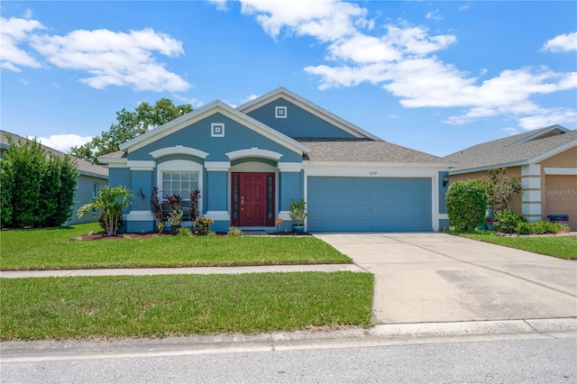 1009 Summer Breeze Dr, Brandon, FL 33511 - ranch-style home with stucco siding, a garage, a front lawn, concrete driveway, and roof with shingles