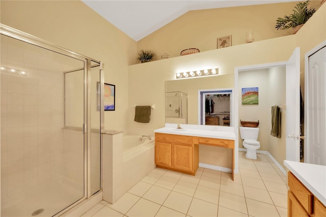 1009 Summer Breeze Dr, Brandon, FL 33511 - bathroom featuring vanity, tile patterned flooring, a stall shower, a bath, and lofted ceiling