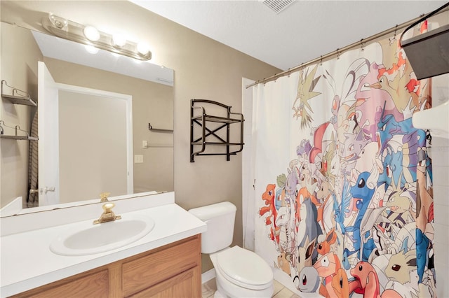 1009 Summer Breeze Dr, Brandon, FL 33511 - bathroom featuring vanity, toilet, and a shower with curtain