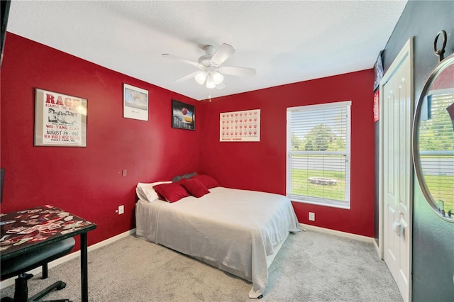 1009 Summer Breeze Dr, Brandon, FL 33511 - carpeted bedroom with multiple windows, baseboards, a ceiling fan, and a textured ceiling