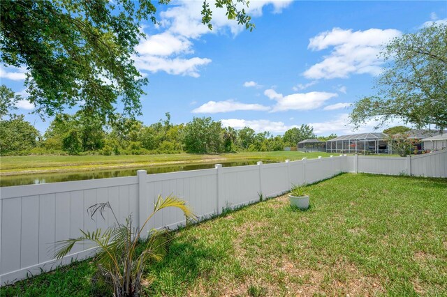 1009 Summer Breeze Dr, Brandon, FL 33511 - view of yard with a water view