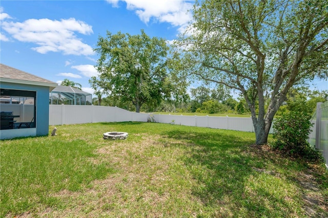 1009 Summer Breeze Dr, Brandon, FL 33511 - view of yard featuring a fire pit
