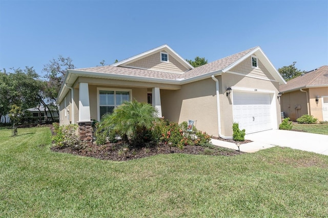 11308 Mollymawk Ct, New Port Richey, FL 34654 - view of front of property with a garage, stucco siding, a front yard, driveway, and roof with shingles