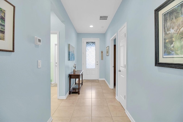 11308 Mollymawk Ct, New Port Richey, FL 34654 - hallway featuring light tile patterned floors, baseboards, and recessed lighting