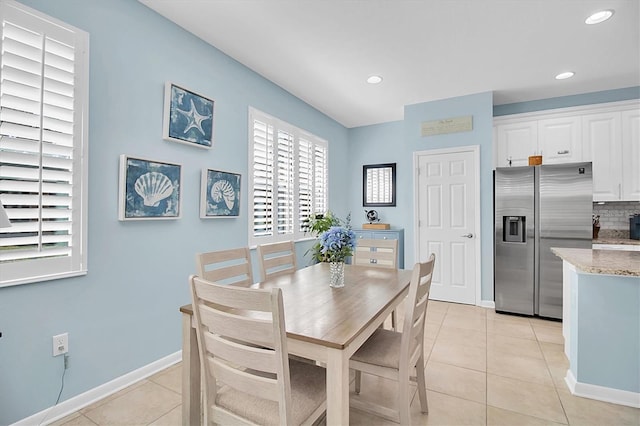 11308 Mollymawk Ct, New Port Richey, FL 34654 - dining room with light tile patterned floors, recessed lighting, and baseboards