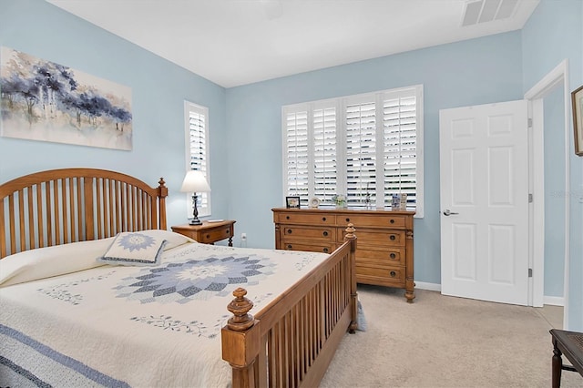 11308 Mollymawk Ct, New Port Richey, FL 34654 - bedroom featuring light carpet and baseboards
