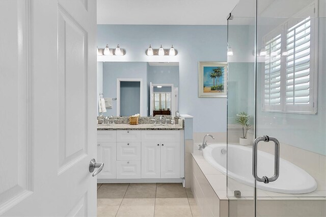 11308 Mollymawk Ct, New Port Richey, FL 34654 - full bath featuring a bath, vanity, and tile patterned floors