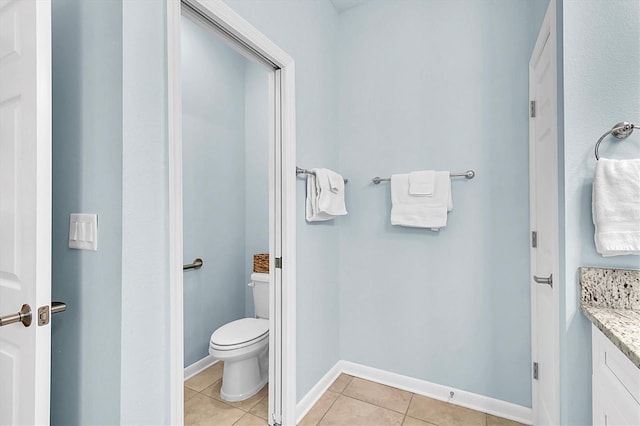 11308 Mollymawk Ct, New Port Richey, FL 34654 - bathroom featuring tile patterned flooring, toilet, vanity, and baseboards