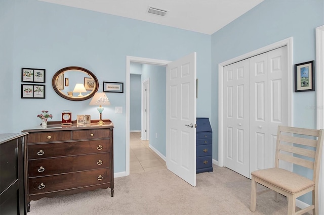 11308 Mollymawk Ct, New Port Richey, FL 34654 - bedroom with light colored carpet, a closet, and baseboards