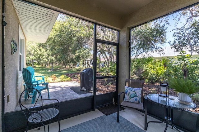11308 Mollymawk Ct, New Port Richey, FL 34654 - sunroom with an outdoor living space
