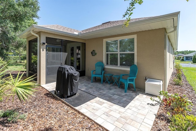 11308 Mollymawk Ct, New Port Richey, FL 34654 - view of patio with a grill and french doors