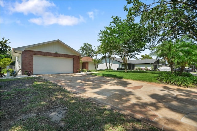2866 Thistle Ct N, Palm Harbor, FL 34684 - ranch-style home featuring brick siding, driveway, an attached garage, and a front lawn