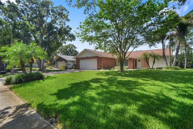 2866 Thistle Ct N, Palm Harbor, FL 34684 - ranch-style home with an attached garage, a front yard, driveway, and brick siding