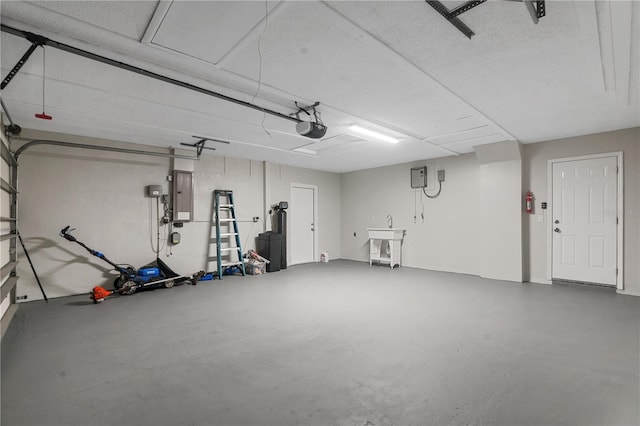 2866 Thistle Ct N, Palm Harbor, FL 34684 - garage featuring a garage door opener and electric panel