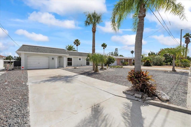 3907 Headsail Dr, New Port Richey, FL 34652 - single story home with concrete driveway, a garage, roof with shingles, and stucco siding