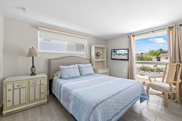 3907 Headsail Dr, New Port Richey, FL 34652 - bedroom with wood finish floors