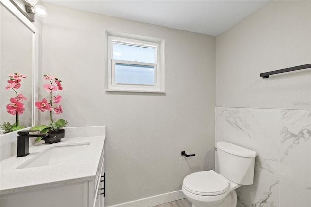 3907 Headsail Dr, New Port Richey, FL 34652 - bathroom with vanity and wainscoting