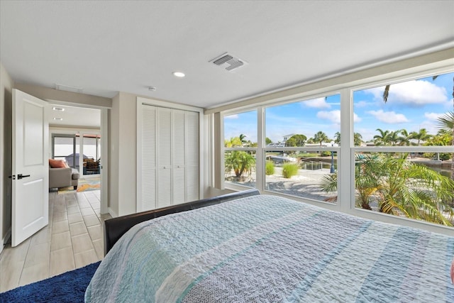 3907 Headsail Dr, New Port Richey, FL 34652 - bedroom featuring recessed lighting and a closet