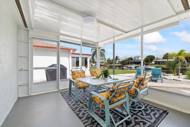 3907 Headsail Dr, New Port Richey, FL 34652 - sunroom / solarium featuring outdoor dining space