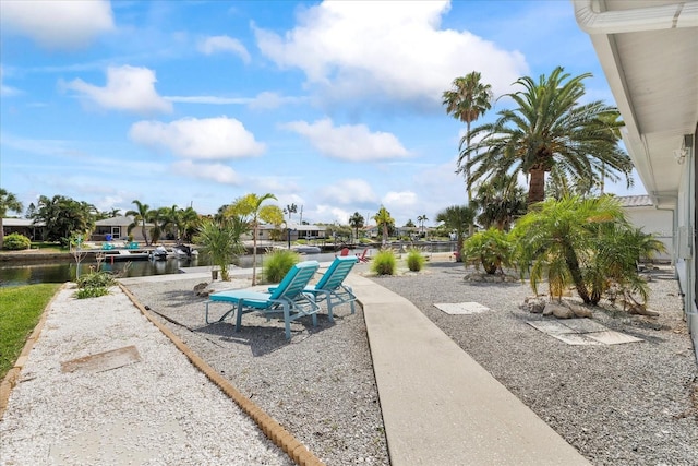 3907 Headsail Dr, New Port Richey, FL 34652 - view of patio / terrace with a water view