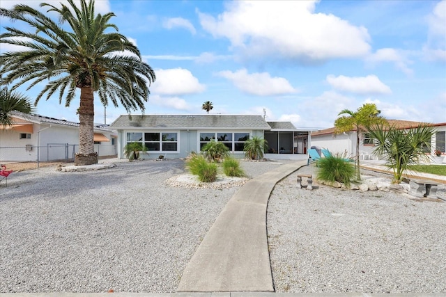 3907 Headsail Dr, New Port Richey, FL 34652 - ranch-style home with a sunroom and driveway