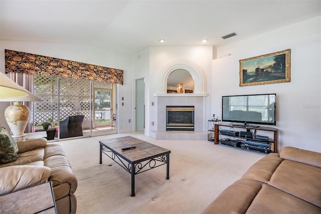 1407 Hickory Moss Pl, Trinity, FL 34655 - living area with carpet, lofted ceiling, a tile fireplace, and recessed lighting