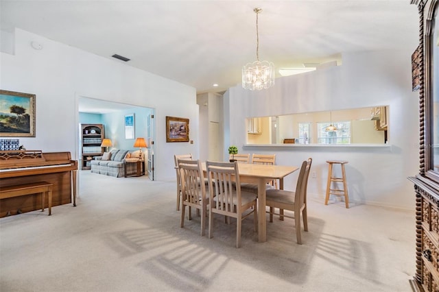 1407 Hickory Moss Pl, Trinity, FL 34655 - dining area with carpet and a chandelier