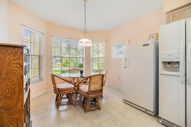 1407 Hickory Moss Pl, Trinity, FL 34655 - dining area featuring baseboards